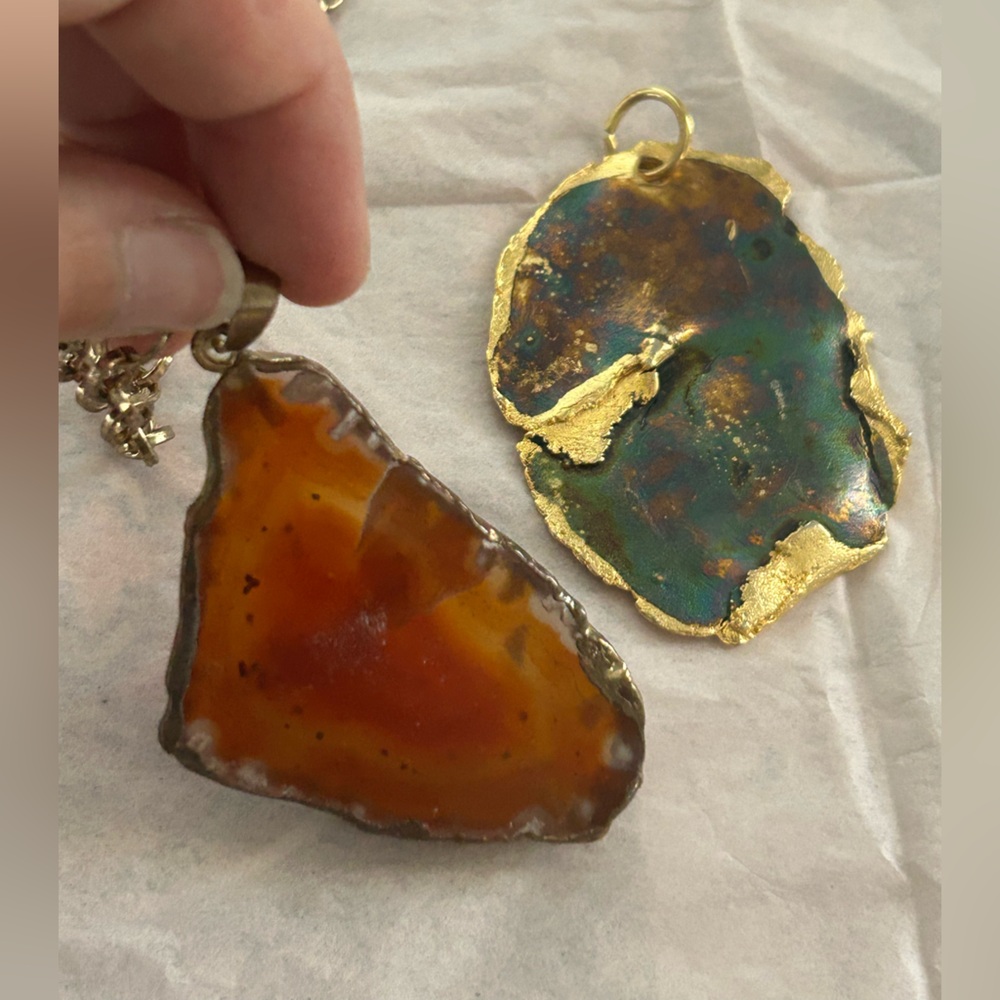 Two artful statement piece pendants